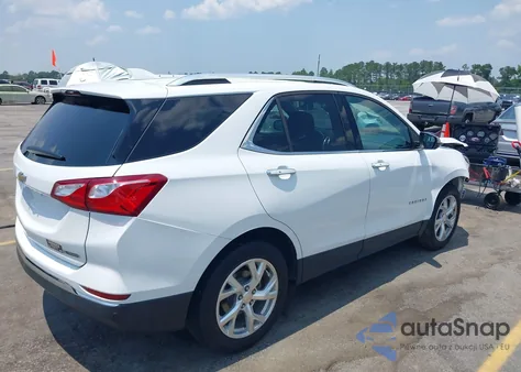 2018 Chevrolet Equinox Premier z USA, uszkodzony, nr VIN 3GNAXMEV8JS595483